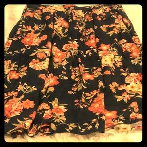 Mid length floral skirt.
